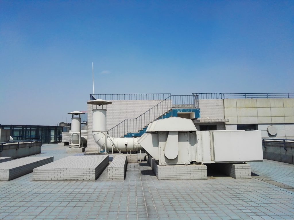 Home ventilation duct on building roof